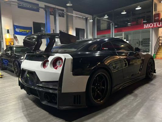 Nissan GTR Karbon fiber gövde Kit GTR r35 2024nismo tarzı yükseltilmiş ön ve arka tampon spoilerleri kaputu koruyucuları