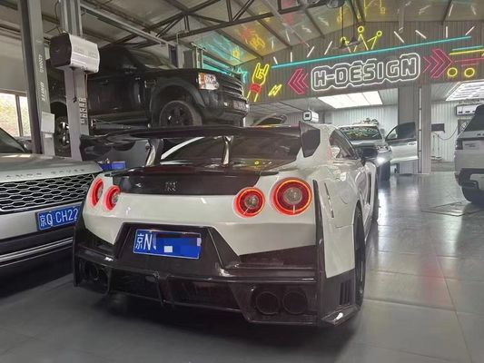 Nissan GTR Karbon fiber gövde Kit GTR r35 2024nismo tarzı yükseltilmiş ön ve arka tampon spoilerleri kaputu koruyucuları