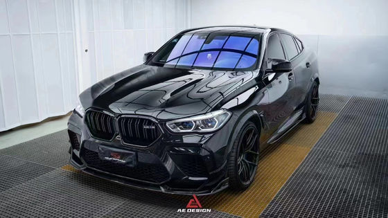 BMW X6M F96 Karbon Fiber Body Kit için X6M F96 AE Tarzı Karbon Fiber Front Lip Diffuser Spoiler'ı yükseltir